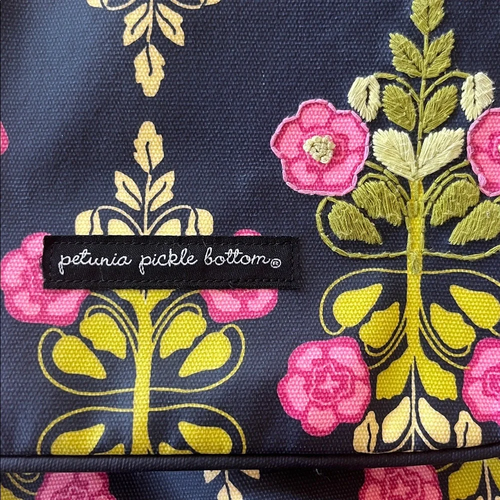 Petunia Pickle Bottom Navy Blue Diaper Bag with Pink and Green Floral Design